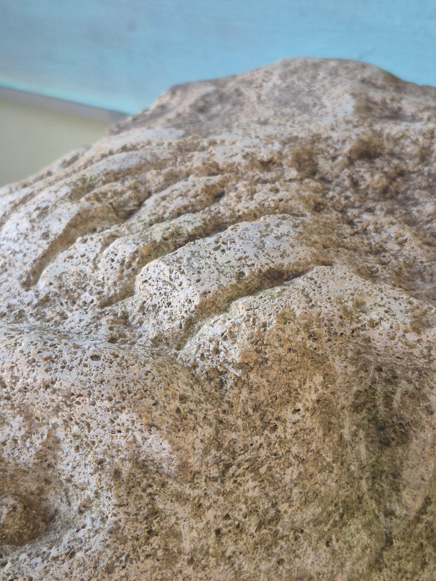 Antique stone gargoyle fragment