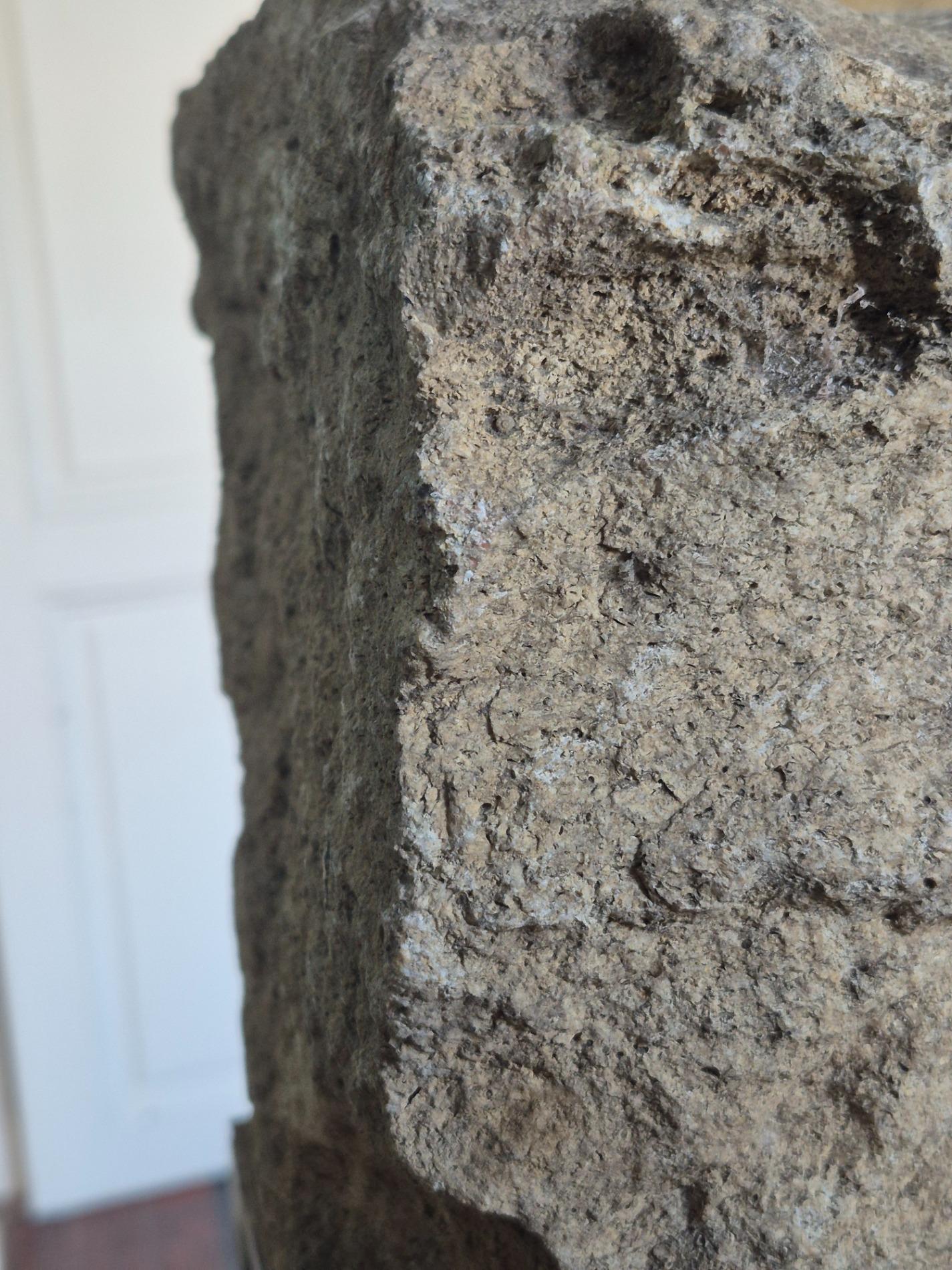 Antique stone gargoyle fragment