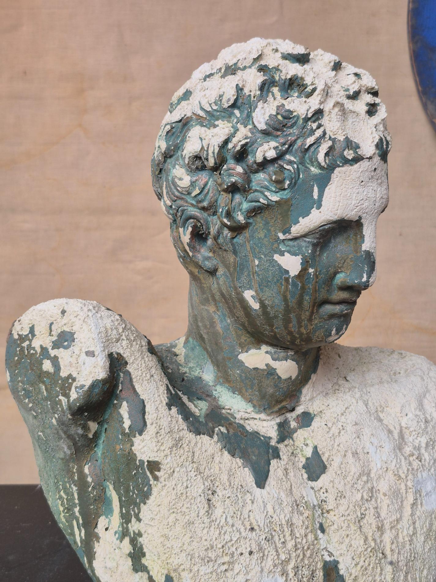 Old garden statue of 'Apoxyomenos'