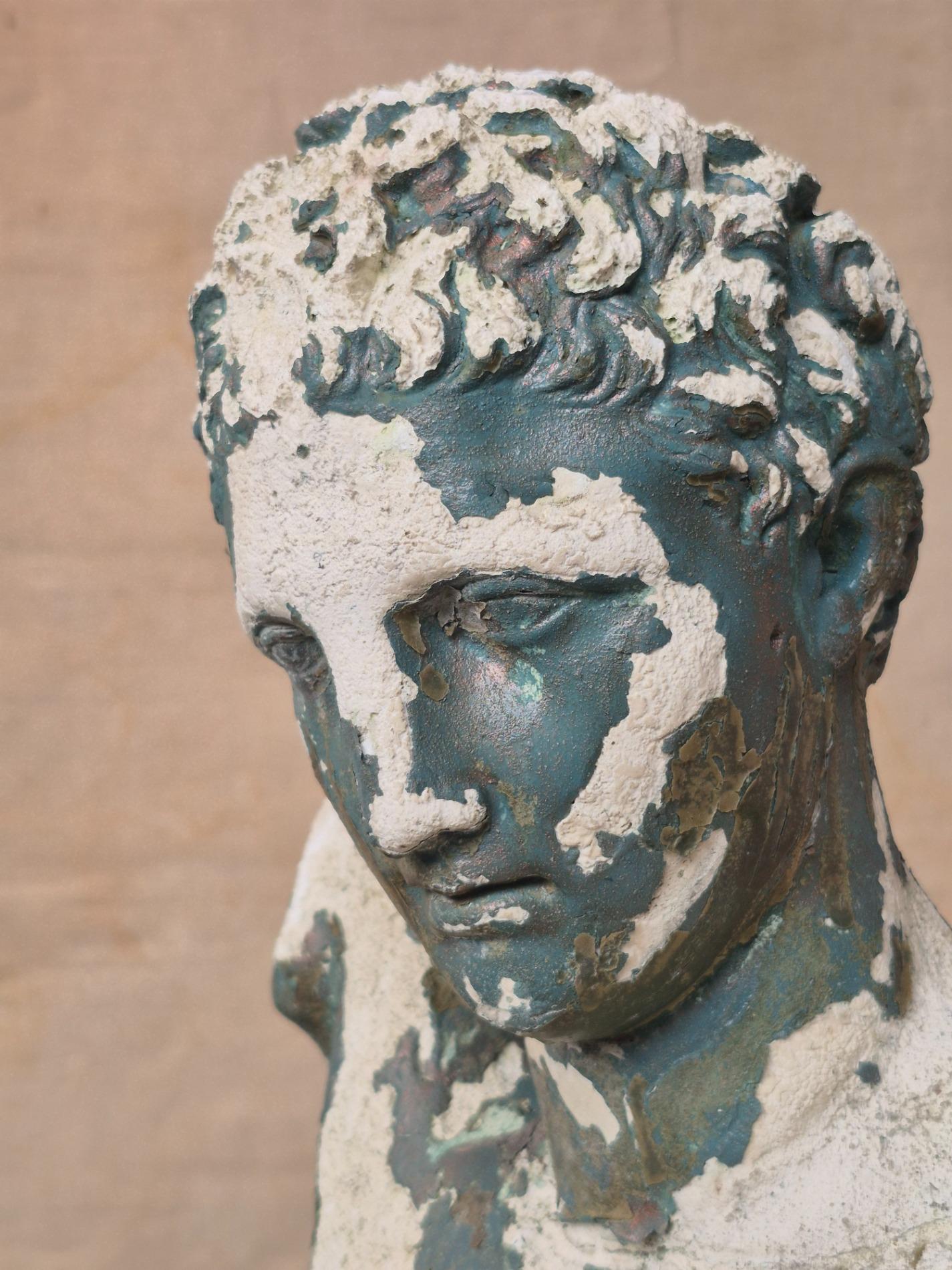Old garden statue of 'Apoxyomenos'