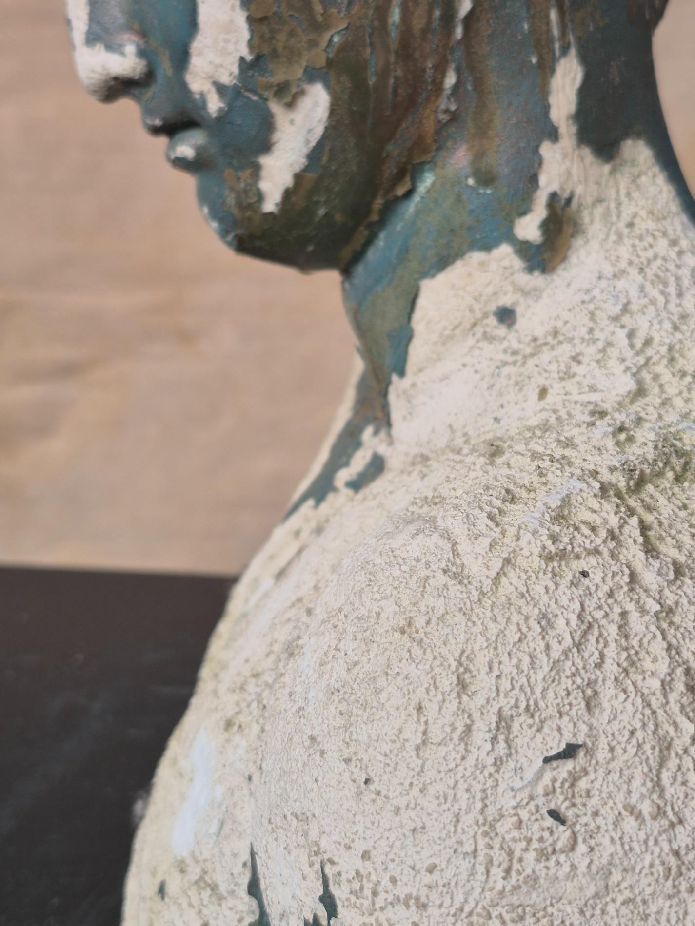 Old garden statue of 'Apoxyomenos'