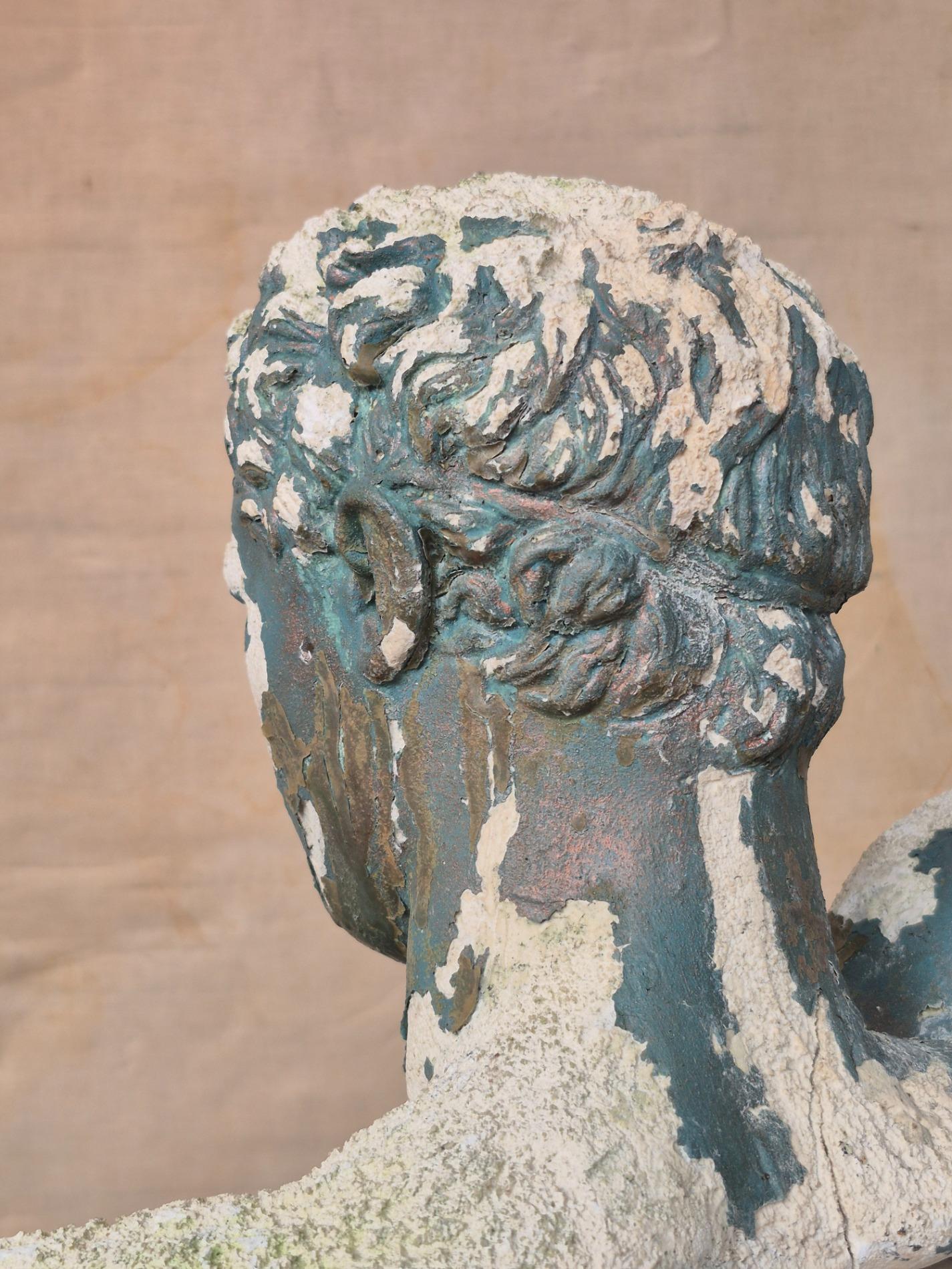 Old garden statue of 'Apoxyomenos'